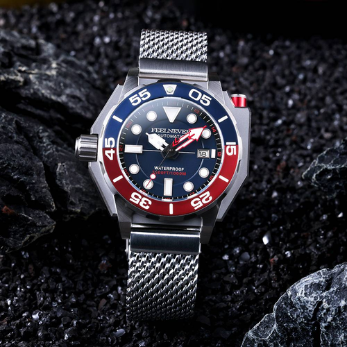 Watch with a red and blue bezel on a dark textured background